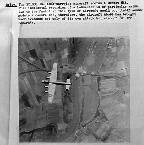 AIR14-3647 Lancaster of 617 Squadron scoring a direct hit on railway bridge 1944