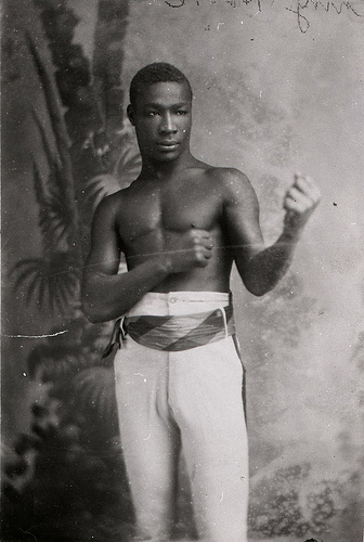 "Photograph of Ching Hook in fighting attitude." Catalogue reference: COPY 1/392/58