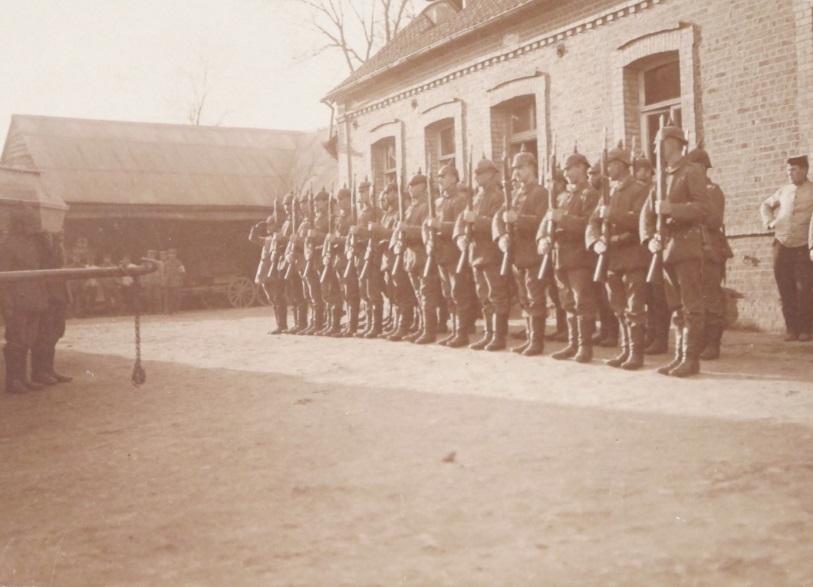 The German Guard of Honour for Lieutenant Geoffrey Joseph Lightbourne Welsford, his coffin being borne on the left (catalogue reference: WO 339/30681)