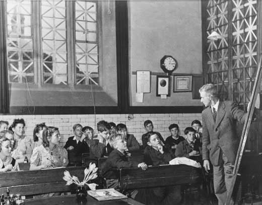 Harry Hill, Headmaster of Lacock School, teaching. Image courtesy of Wiltshire and Swindon History Centre