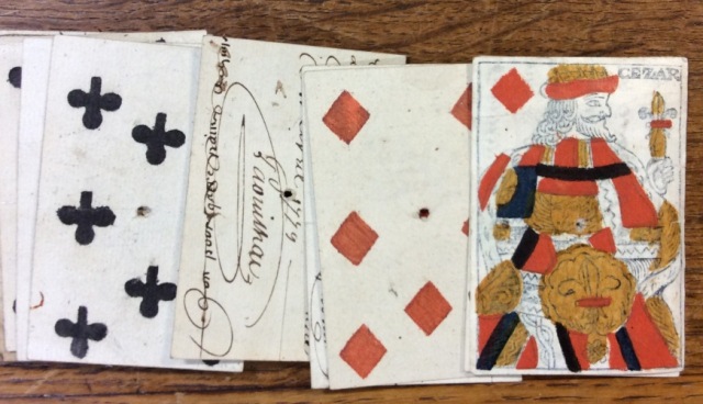Four loose playing cards, two of which have laundry lists [1773] (catalogue reference: HCA 65/47)