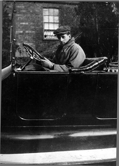 Image of Robert Ashley Crowder at the wheel of the family's Studebaker