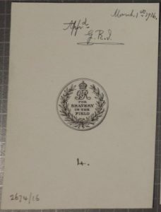 Pen and ink design drawing for medal, it bears a laurel wreath and crown surrounding the Royal Cypher (GVR) and the words "FOR BRAVERY IN THE FIELD", it has also been initialled by the King to show his approval