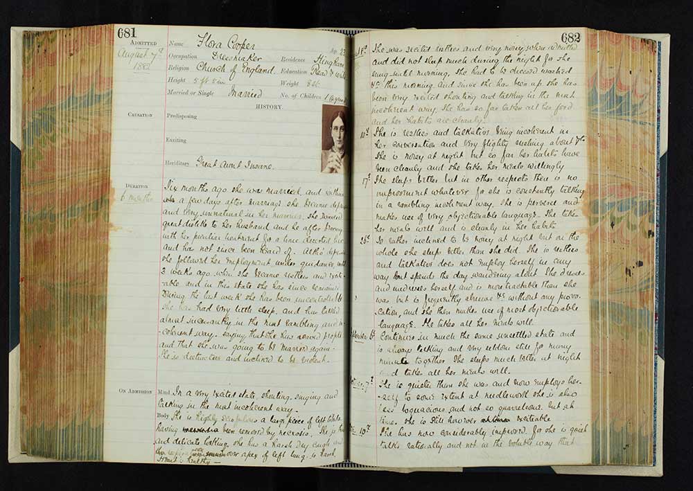 Image of an open book with writing covering both pages