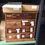 Image of small wooden chest of drawers with eight drawers