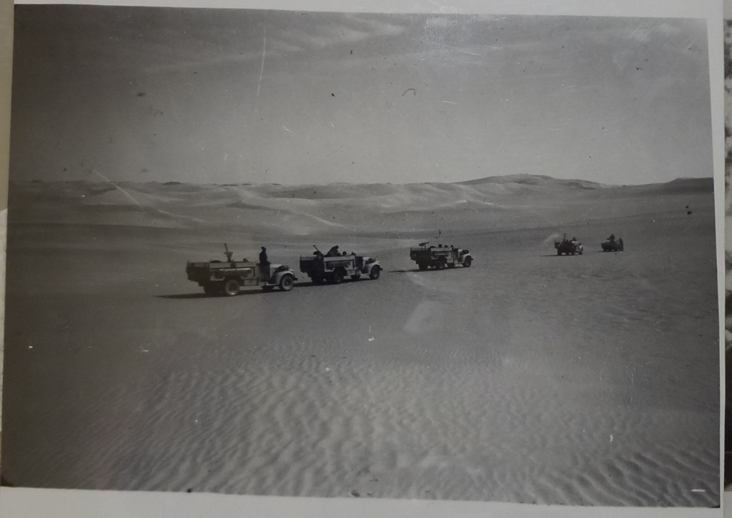 Photograph of the Long Range Desert Group in the Western Desert (a line of five vehicles)