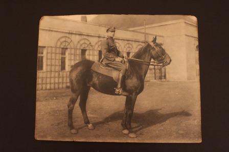 Sepia photograph of Bert sat on a horse