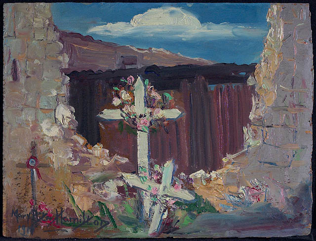 A colour painting of several crosses festooned with flowers in the middle of a gaping stone wall. Behind is a brown structure and the sky is blue with white clouds.
