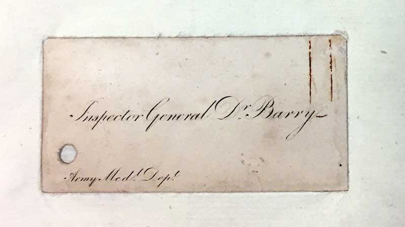 Image of a card with the name J Barry written on it 
