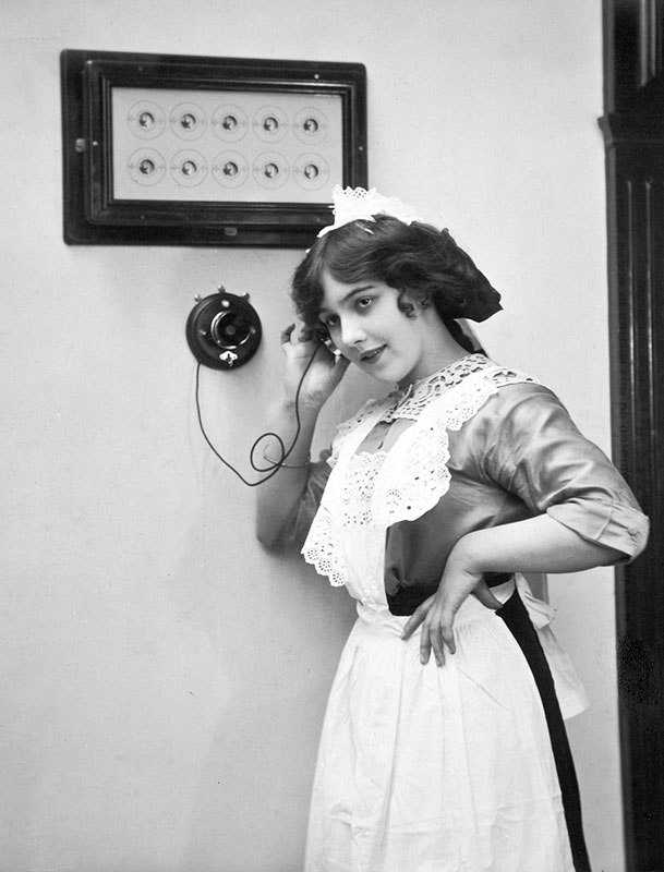 COPY 1/565 - Edwardian maid using the telephone