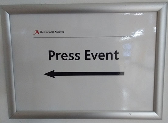 A sign directing journalists to our press event