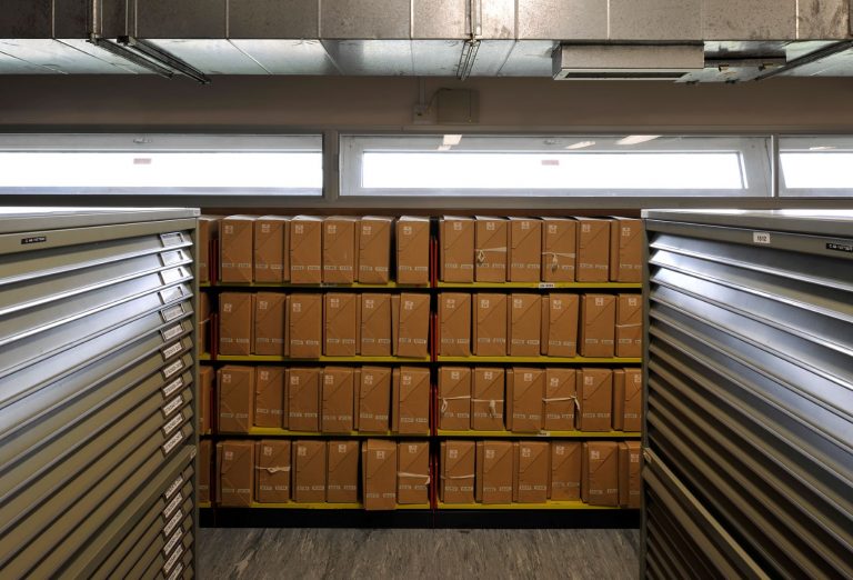 A photograph of the interior of The National Archives repositories.
