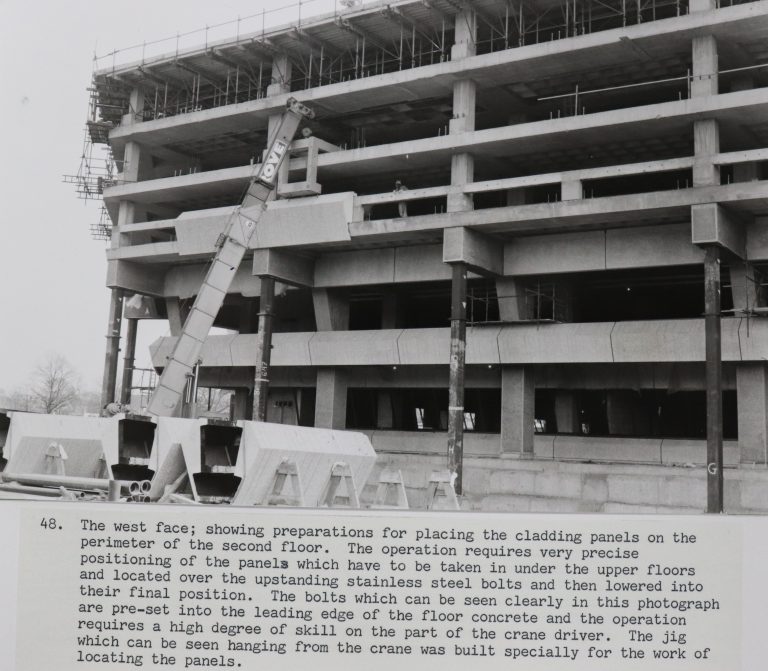 A photograph of concrete cladding installed on Q1 building in the 1970s,