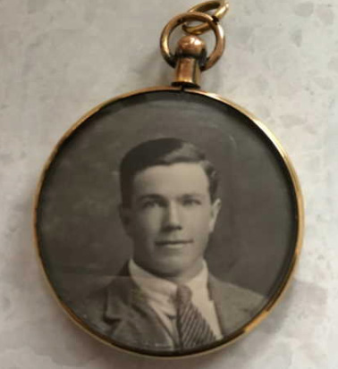 Robert John Davidson in a locket pendant photograph