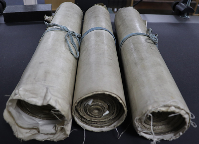 Image shows a number of close rolls held at The National Archives.