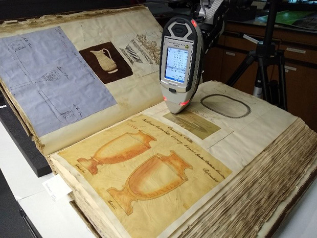 X-ray fluorescence spectroscopy (XRF) analysis on an albumen print contained in a bound book.