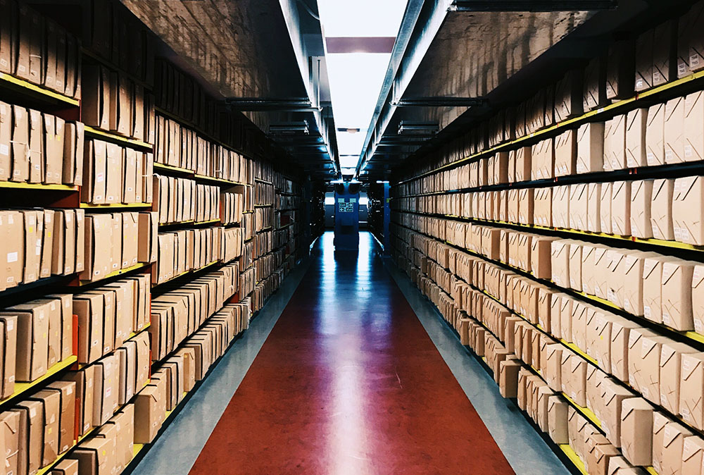 Colour photograh of a repository containing boxes.