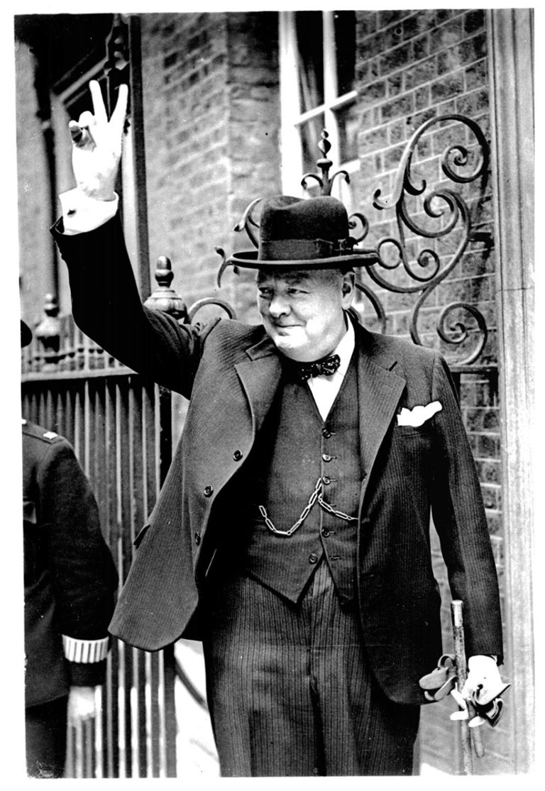 Winston Churchill, photographed giving his famous 'v for victory' hand gesture, c.1944.