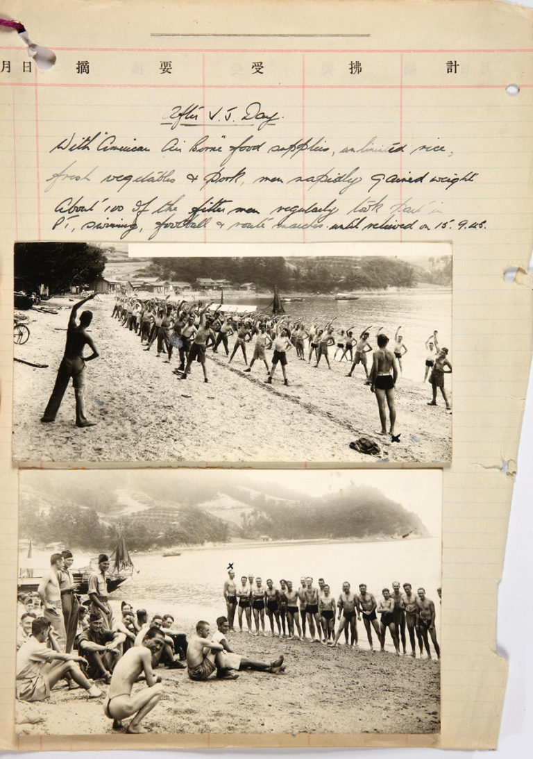 Page from a notebook featuring two photographs of recently-liberated British and Allied POWs taking part in PT exercises with US Airborne soldiers on a beach near Nagasaki. Using American supplies, along with locally-sourced food including fresh vegetables and meat, these former prisoners gained weight, and 100 of the fitter men were able to take part in PT drill, swimming, route marches and football matches. They departed Nagasaki after 15 September 1945.