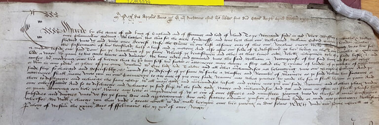 Handwritten page of text containing a description of how a London butcher was rewarded for providing food 'unto our dearest wife the queen in our last absence'.