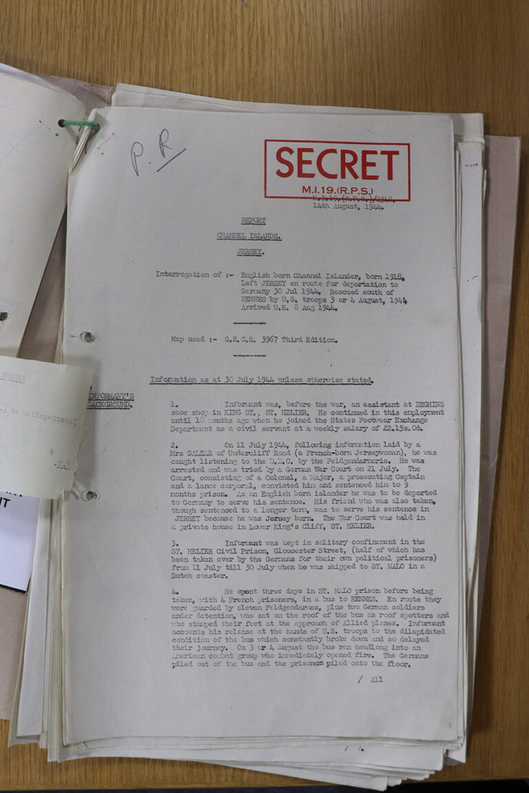The bright red SECRET stamped page of a document is typed.