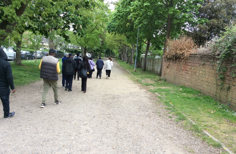 A group of students walking along a path.