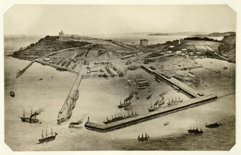 Aerial view of Falmouth Harbour showing many ships.