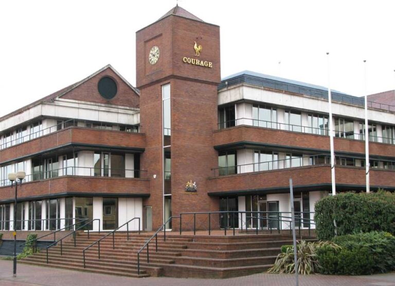 Exterior photograph of a large, red-brick building which is Ashby's brewery today.