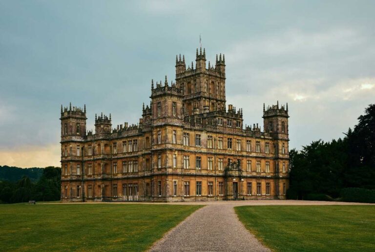 An ornate country house with dozens of turrets.