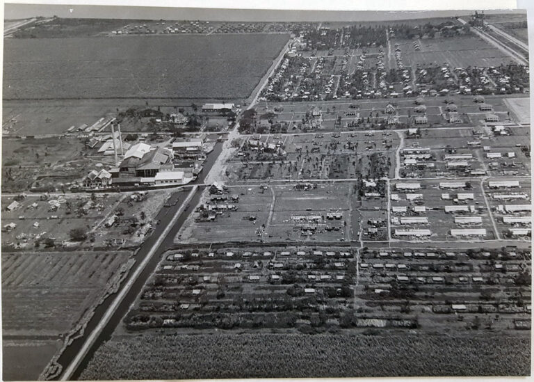 A black and white aerial photograph of a sugar estate in Guyana.
