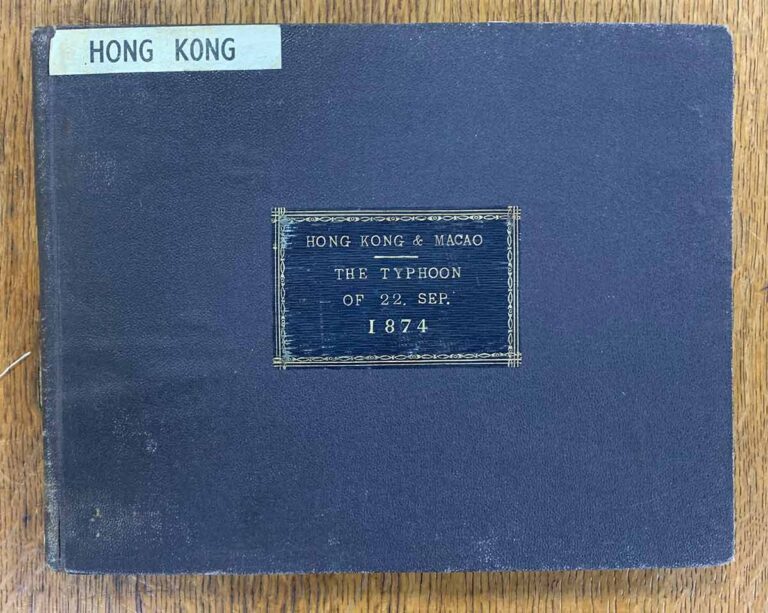 A wide, blue cover with its title inlaid inside a decorative border.