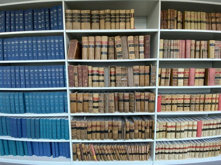 Old legislation books on a library shelf at The National Archives. 
