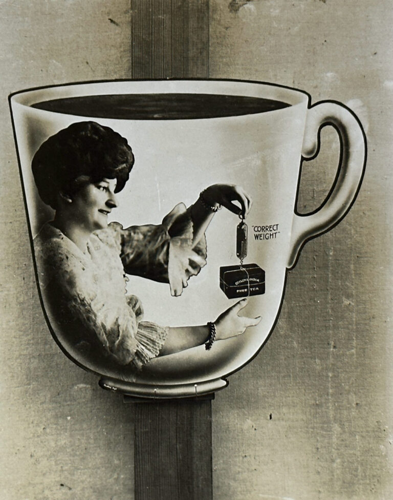 A mug with a female measuring a bag of tea, which reads 'correct weight'.