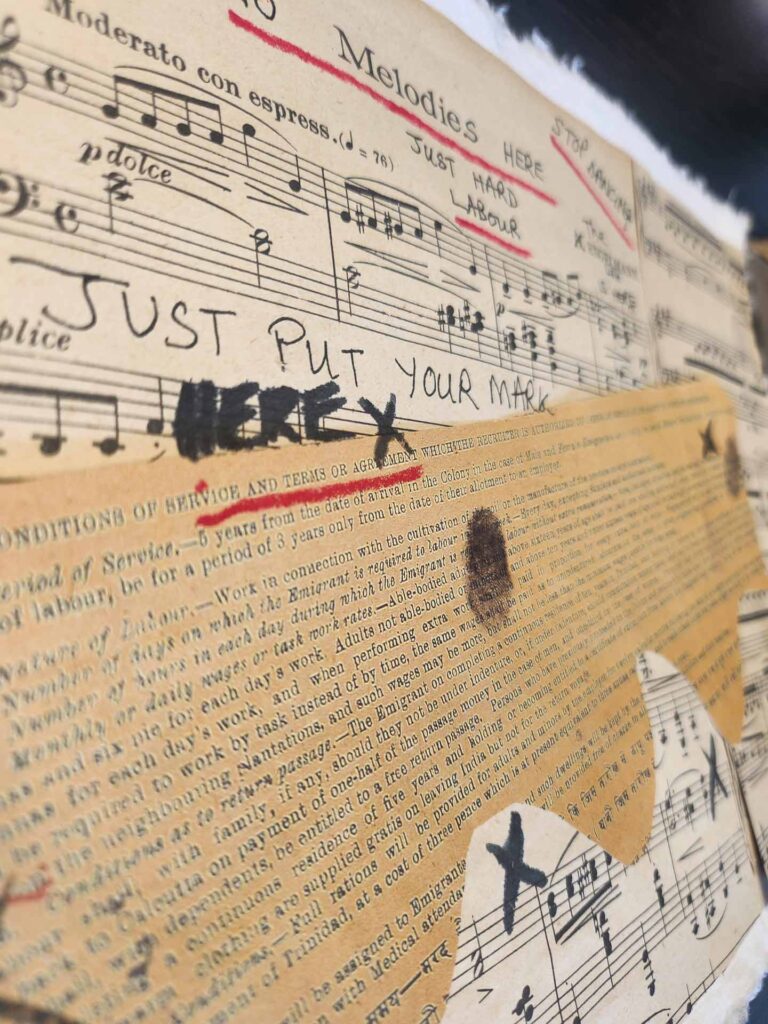 A piece of artwork created during a creative workshop at The National Archives. It's collage piece featuring a sheet of music titled 'Melodies here'. There is handwriting over the music and a typed record below.