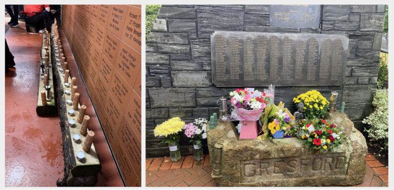 The photo on the left shows a number of candles lit on the floor in front of a brick wall that has names written on it. The photo on the right shows flowers and wreaths laid on a memorial that includes a list of 266 names. 